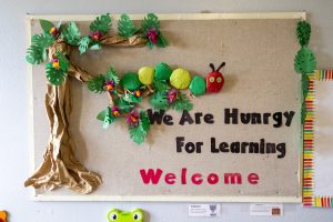 Welcome sign in a preschool classroom that features the Hungry, hungry caterpillar