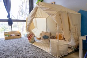 Cozy reading nook in a preschool classroom