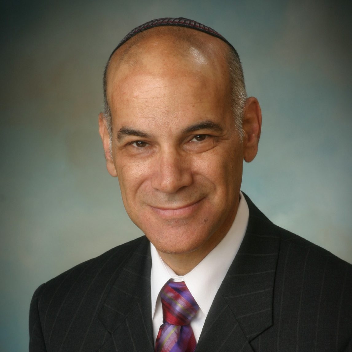 Headshot of Rabbi Rosenthal